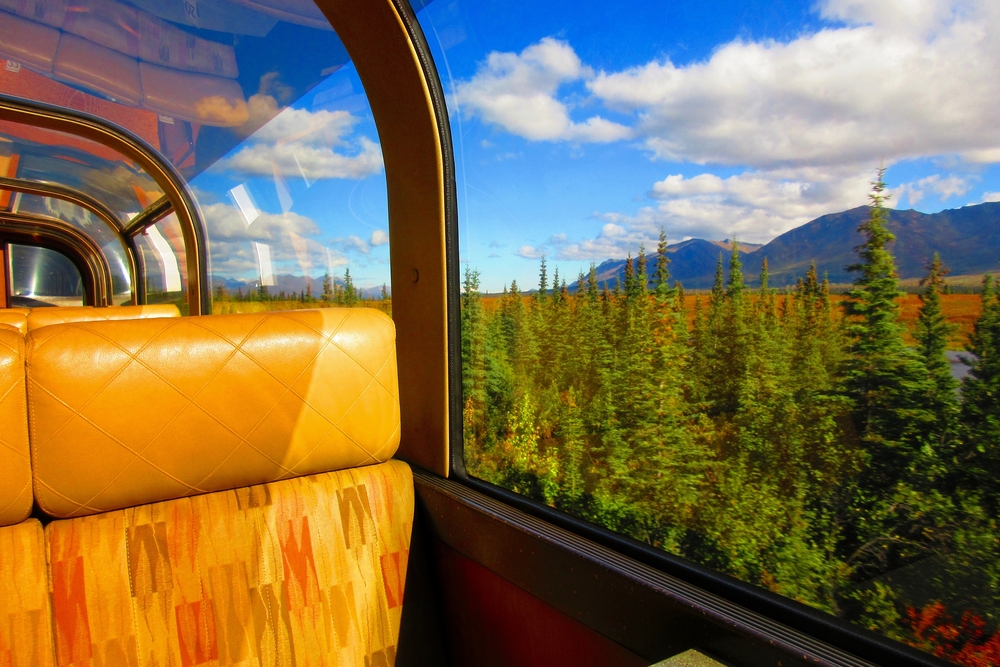 Beautiful fall day view from window on Alaska Railroad train